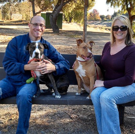 Pumpkin with her adopted “sister” Sinnamon and loving guardians John and Melissa    photo: courtesy janet song